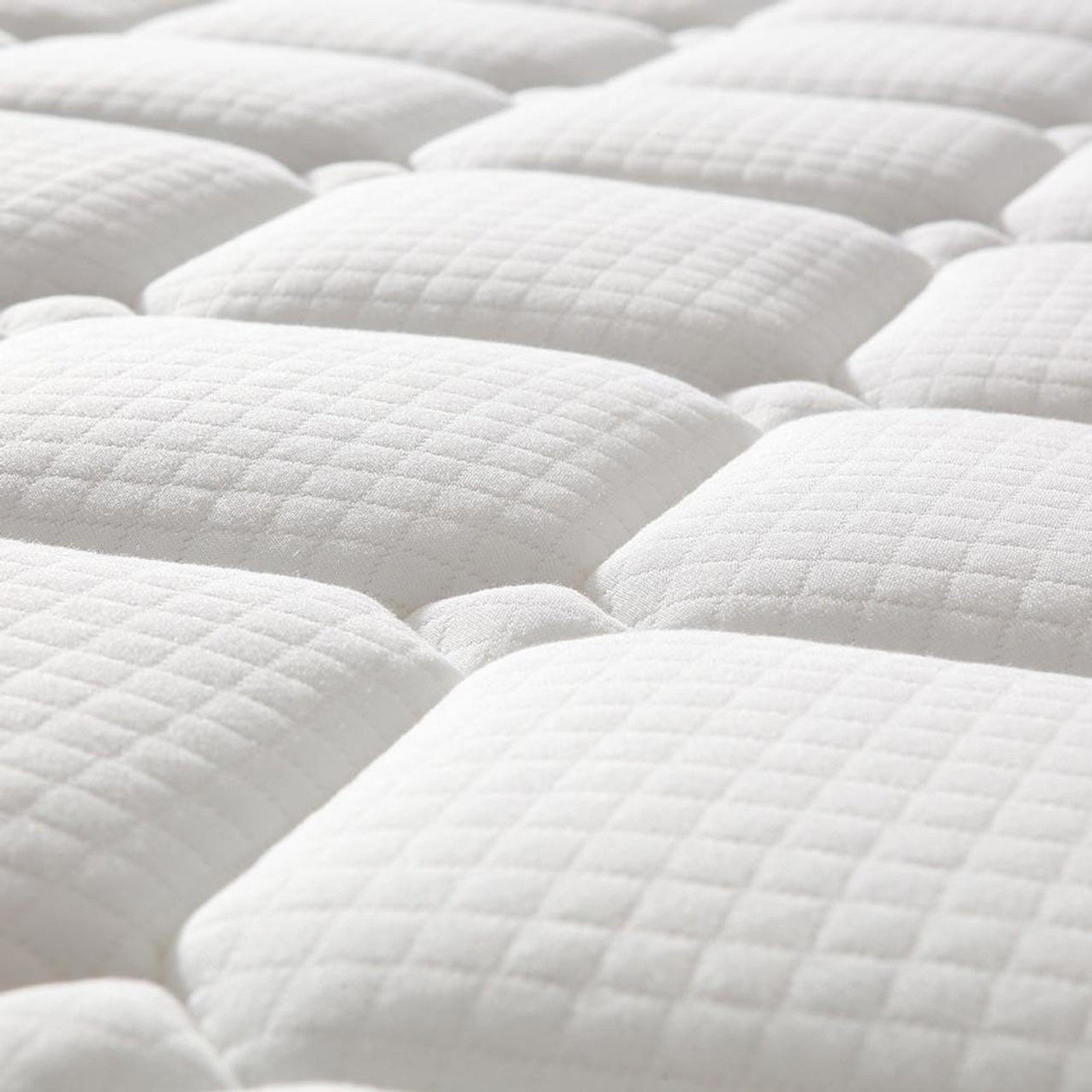 Close-up of the quilted mattress surface from the Aristos & Venus Bunk Bed & Mattress Package in White & Natural, showcasing its padded, tufted square pattern, highlighting comfort and quality.