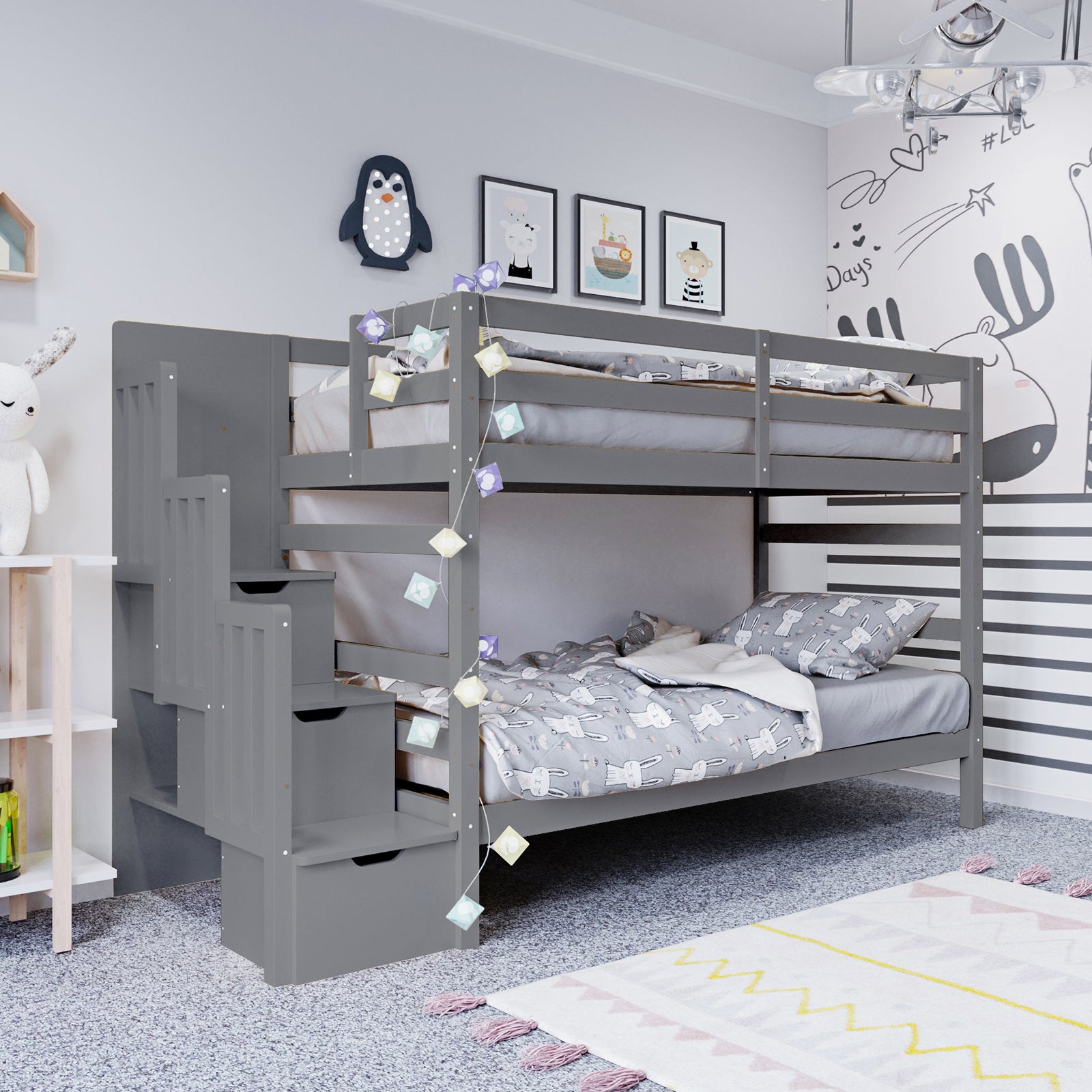Galla Staircase Storage Bunk Bed - Grey Solid Wood shown with built-in staircase drawers and side shelves, emphasizing functionality and durability, ideal for organizing a child's room, featuring plush safety guard rails.