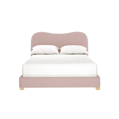 Ginnie Double Curved Boucle Cloud Bed Frame in Pink; features a blush-pink upholstered frame with a curved headboard, white bedding, and wooden feet against a plain white background, exuding modern elegance.