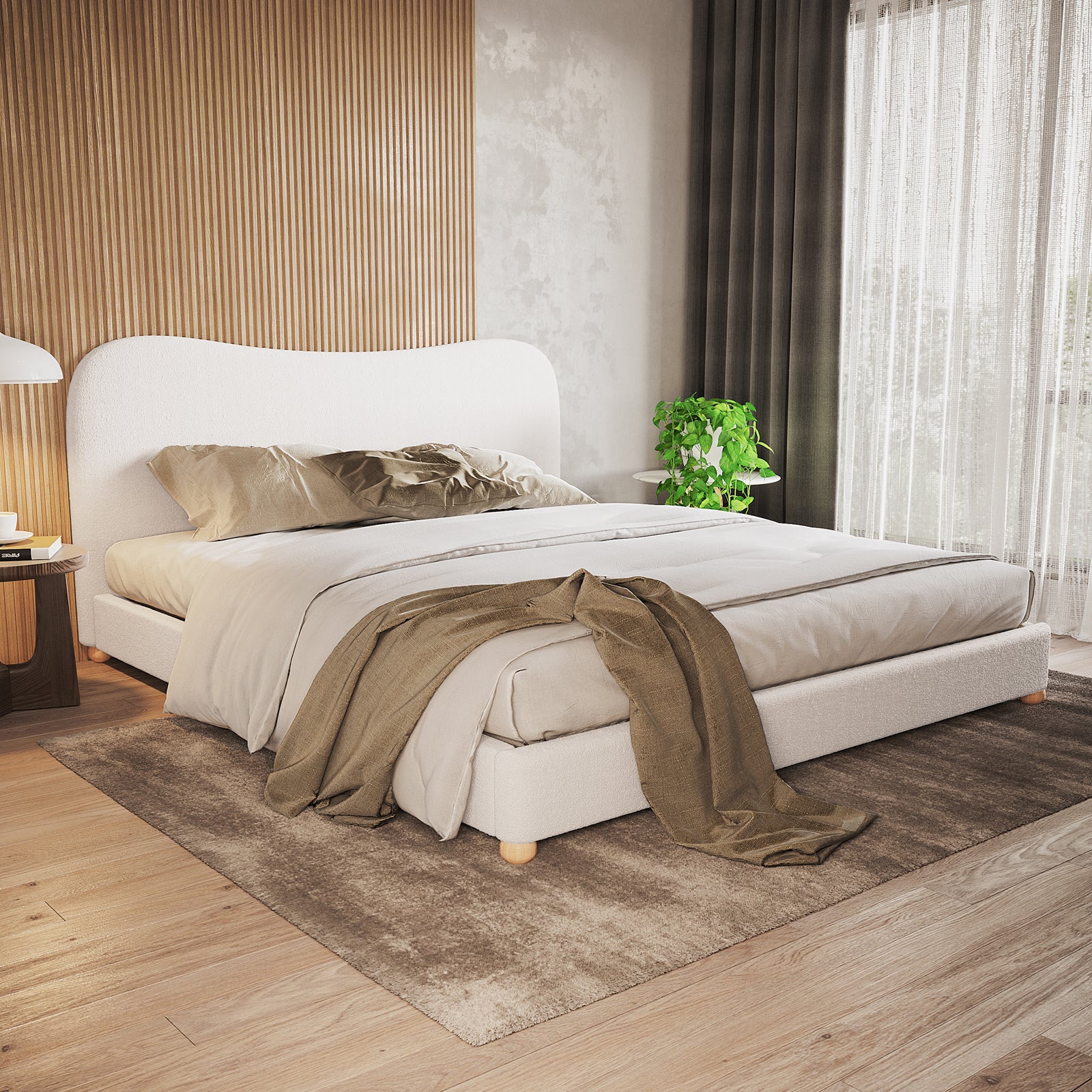 Ginnie Bouclé Curved King Bed Frame - Cream White in a minimalist bedroom with ribbed wood accent wall, neutral bedding, wooden bedside table, and soft natural light from floor-to-ceiling windows.