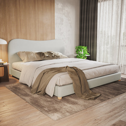 Ginnie Curved Linen Fabric Cloud Bed Frame - Grey King, featuring a low-profile design with a plush curved headboard, set in a serene bedroom corner with neutral bedding and elegant decor.