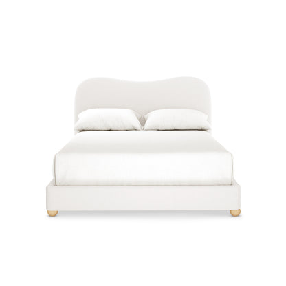 Ginnie Boucle Bed & Oriona Mattress - Double Cream featuring a curved headboard in plush bouclé fabric, paired with a 25cm thick mattress, showcased with fluffy white pillows for a luxurious sleep experience.
