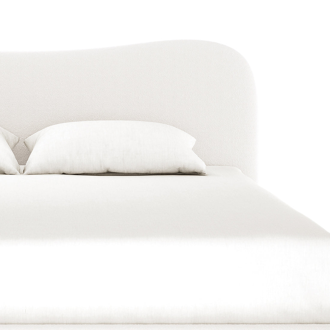 Ginnie Curved Bouclé Bed Frame - Cream White features a softly curved headboard with a plush bouclé texture, a neatly made mattress, and two white pillows, creating a serene bedroom setting.