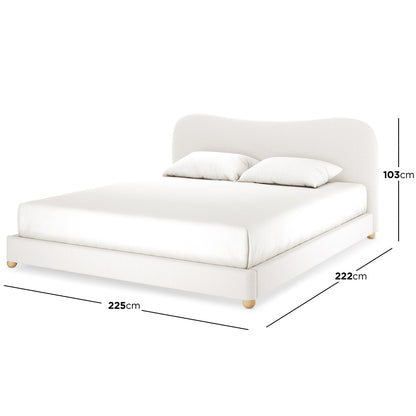 Ginnie Curved Bouclé Bed Frame - Cream White Super King features a low-profile design with a 103cm curved headboard, white upholstery, and small wooden feet, showcasing dimensions of 225cm length and 222cm width.