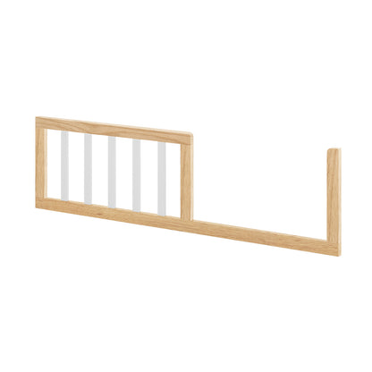 Giro Solid Pine Toddler Bed Rail Kit White Natural shows a wooden side-rail with white vertical slats, designed to slide under a mattress, preventing toddlers from rolling out of bed.