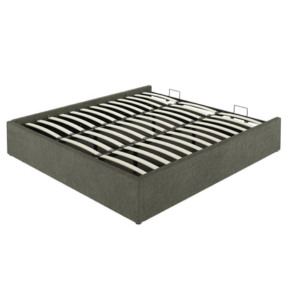 Aquila King Extra Wide Headboard & Fabia Gas-lift Storage Bed Base Set in Green, featuring a low-profile platform frame with dark gray fabric and spring-style wooden slats on a metal support.