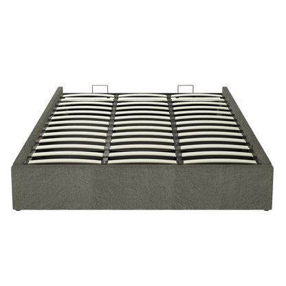 Aquila King Extra Wide Headboard & Fabia Gas-lift Storage Bed Base Set in Green features a low-profile upholstered base with sprung wooden slats and a central metal support for mattress placement.