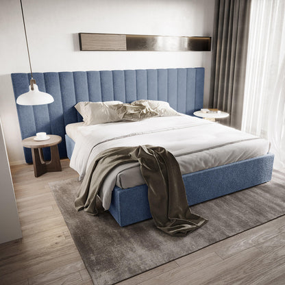 Aquila King Extra Wide Bouclé Headboard in Midnight Blue, featuring vertically channelled design, soft bouclé fabric, and expansive width, set against a minimalist bedroom with complementary white and olive bedding.