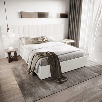 Aquila Queen Extra Wide Bouclé Headboard in Cream White, featuring a tall, paneled design, is the bedroom's focal point. It complements the modern decor, enhancing the room's elegance and comfort.