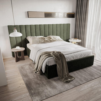 Aquila Queen Extra Wide Bouclé Headboard in Green, featuring a vertically stitched tall headboard, upholstered in textured fabric, complements off-white linens and taupe throw on a low-profile bed.