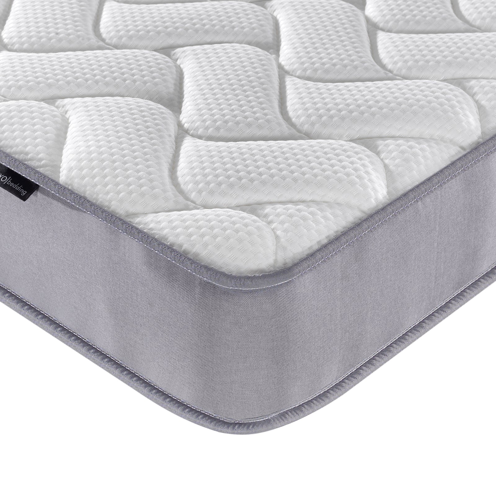 Harel & Vesta Slide Bunk Bed & Vesta Mattress Set in Natural, highlighting the quilted mattress pad's white, textured top and grey fabric side wall wrapping around the mattress corner.