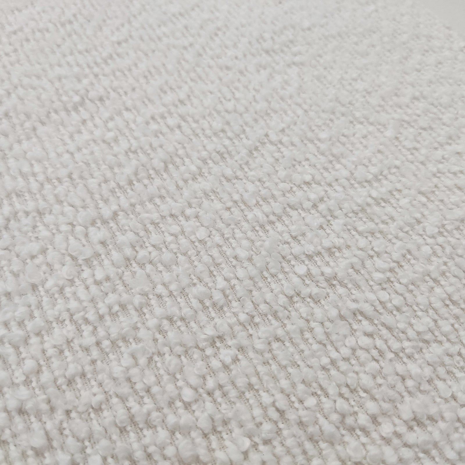 Harper Boucle Queen Bed Frame – Eggshell White showcasing its plush boucle upholstery and sturdy eucalyptus hardwood frame, highlighting the padded headboard and elegant wood accents on the frame's sides and legs.