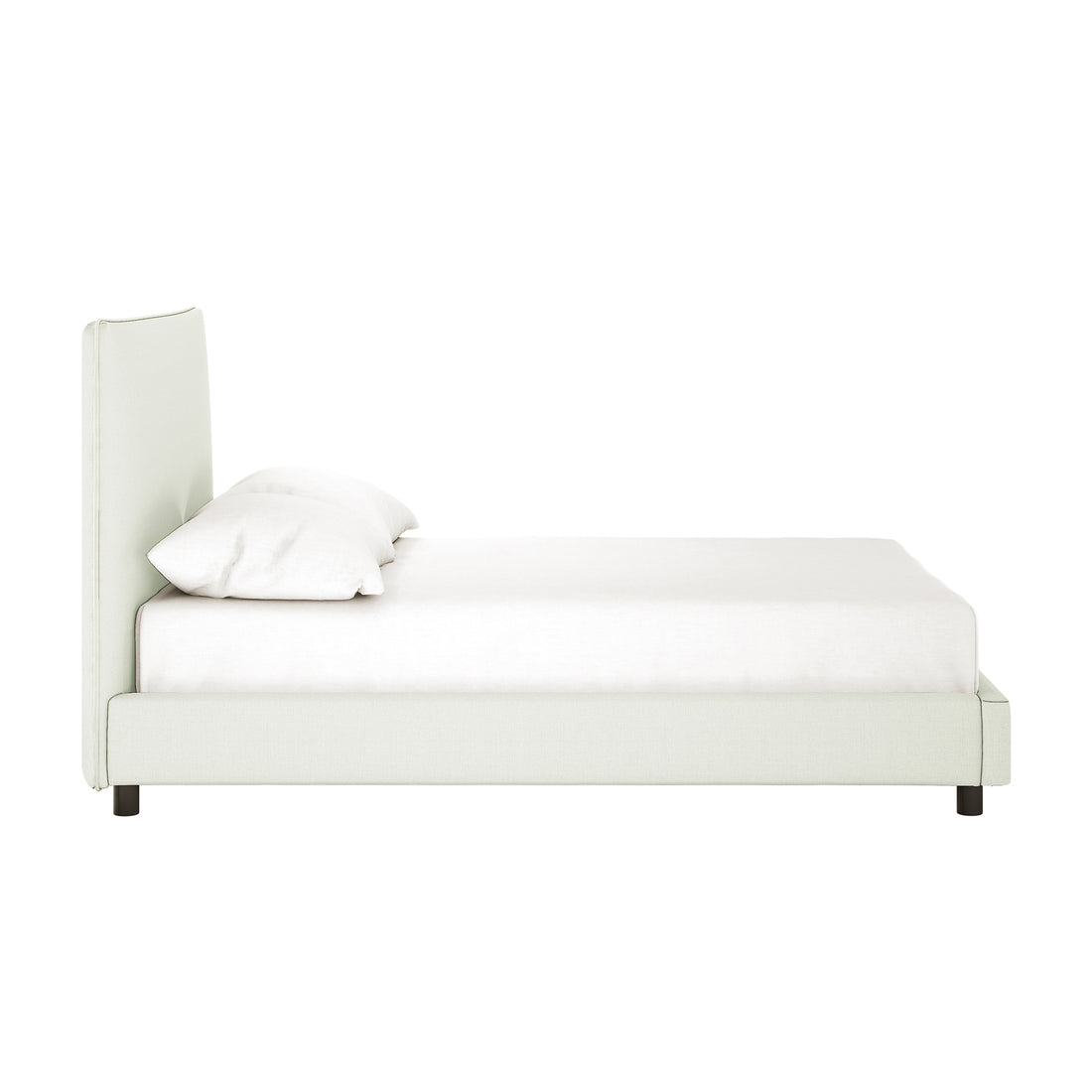 Side view of the Havvan Double Linen Upholstered Fabric Bed Frame in off-white, showcasing its tall upholstered headboard, white mattress and bedding, single pillow, and short dark legs.