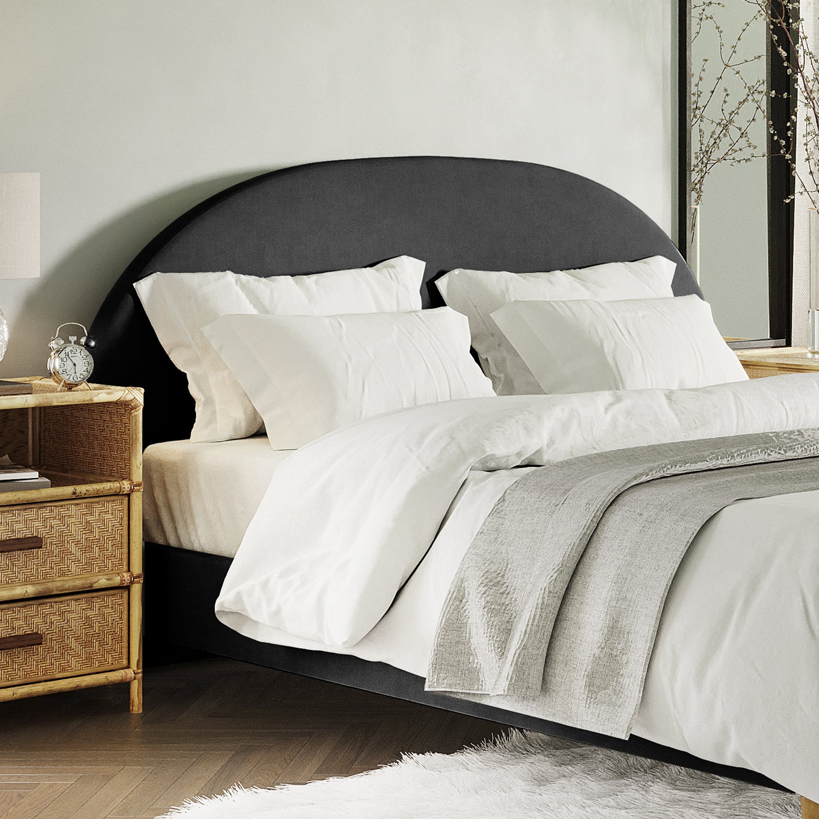 Florus King Arched Boucle Fabric Headboard in Black, featuring a curved silhouette and upholstered in luxurious bouclé, stands as the elegant focal point in a stylishly minimalist bedroom setting.