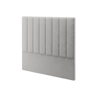Gratiana Double Velvet Fabric Headboard in Slate features vertical channel tufting on top and a smooth fabric lower section, showcasing a sophisticated, modern design against a plain white backdrop.
