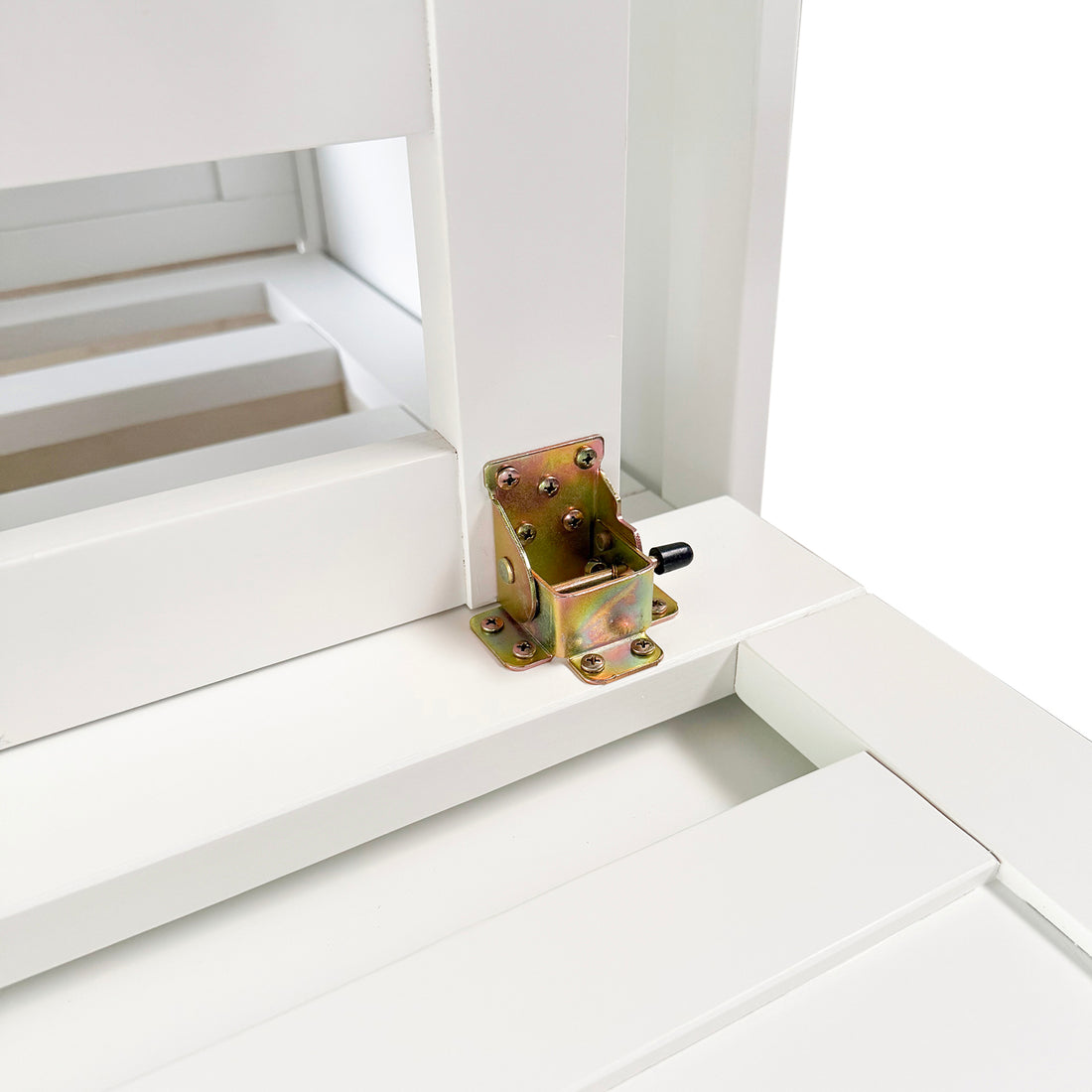 Close-up of the Jaxen Smart Queen Murphy Bed's brass-plated hinge on a white wooden frame, showcasing its durable mechanism designed for folding with the Plico 3-Fold Queen Mattress for space efficiency.