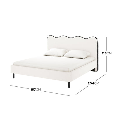 Kaylie Double Boucle Fabric Bed Frame in White & Black features a scalloped headboard, slim black legs, and a mattress with pillows, measuring 157cm wide, 204cm deep, and 116cm tall.