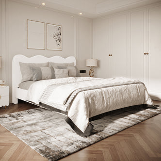 Kaylie Double Boucle Fabric Bed Frame in Cream White, featuring soft boucle upholstery, scalloped headboard, and sleek metal legs, harmoniously blends into a serene, modern bedroom setting with minimalist decor.