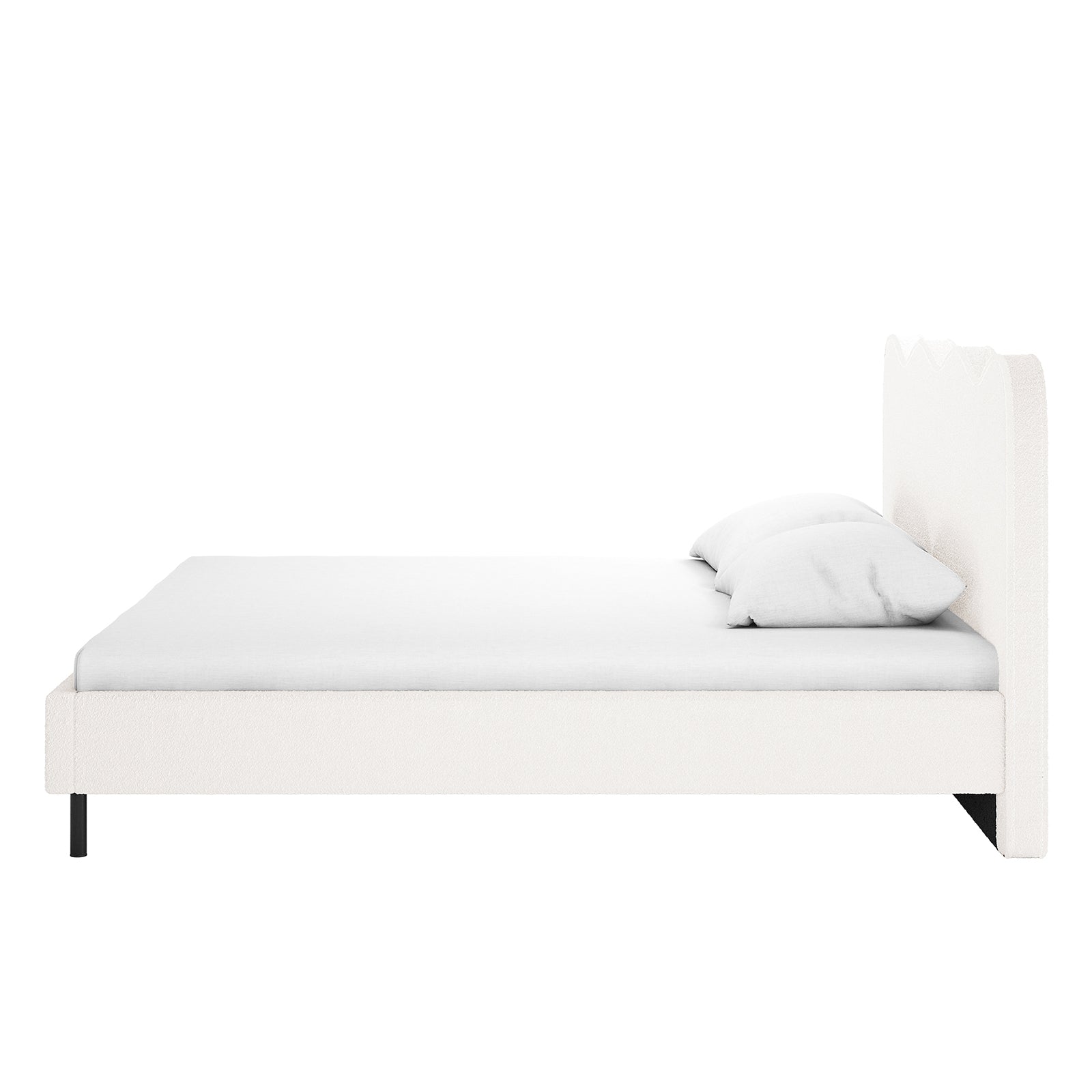 Kaylie Queen Boucle Fabric Bed Frame in Cream White featuring all-white upholstery, a subtly scalloped headboard, low-profile frame with slender black metal legs, complemented by a simple mattress and two white pillows.