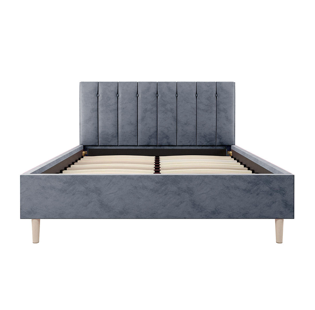 Kelly Double Velvet Bed Frame – Grey features a sleek rectangular headboard with vertical channel tufting, supported by mid-century tapered wood legs, showcasing a luxury design and solid construction.