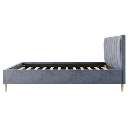 Kelly Double Velvet Bed Frame – Grey with a sleek rectangular headboard featuring vertical channel tufting and mid-century-inspired tapered solid wood legs, creating a stylish and luxurious bedroom centerpiece.