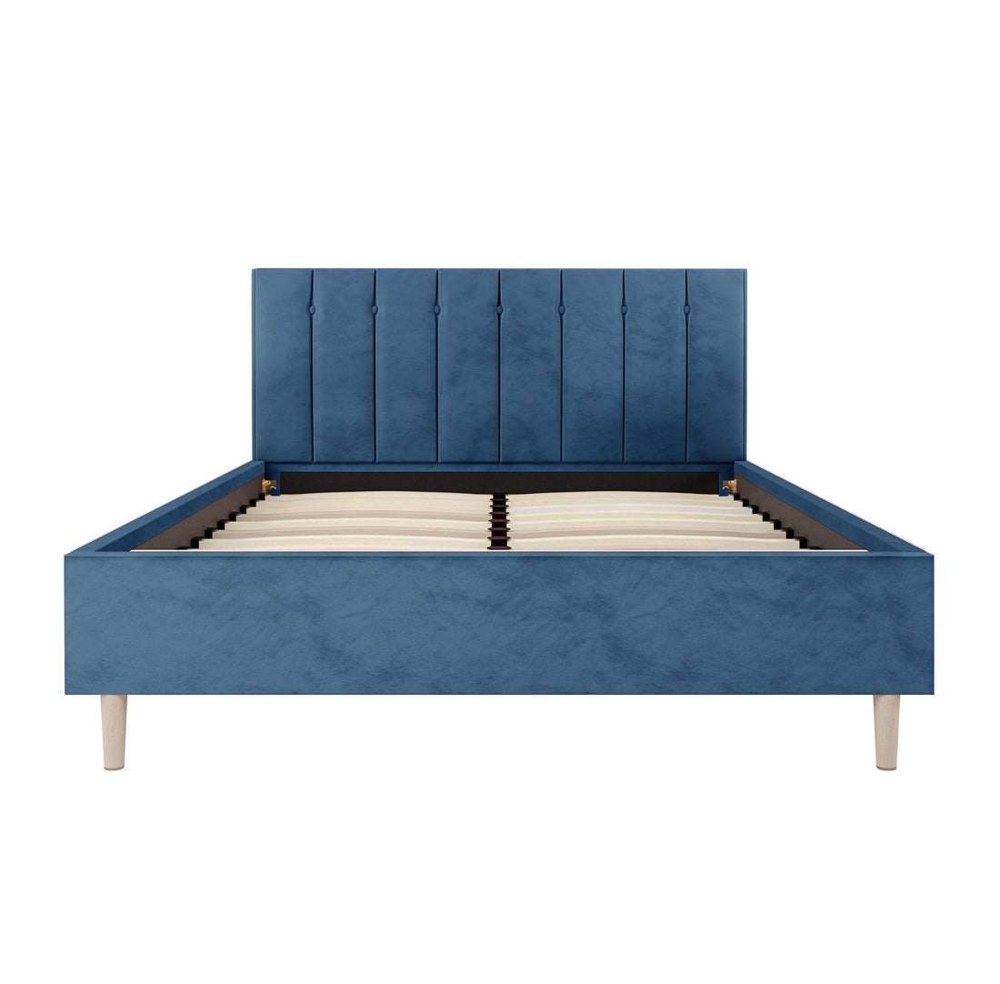 Kelly Double Velvet Bed Frame - Ocean Blue features a plush, tufted headboard with a refined design, supported by mid-century-inspired wooden legs, enhancing bedroom elegance and comfort.