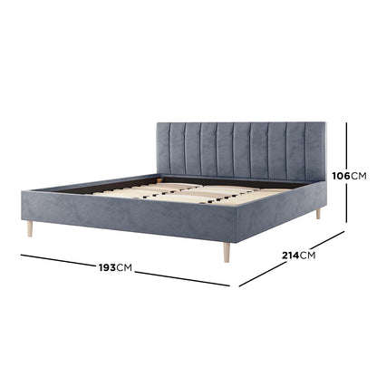 Kelly King Velvet Bed Frame – Grey, featuring luxurious grey velvet upholstery and a vertically tufted headboard, highlighting its sophisticated design with solid wood legs and metal support beams for stability.