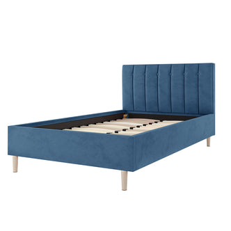 Kelly King Single Velvet Bed Frame - Ocean Blue features a velvet-upholstered headboard with vertical tufting, complemented by a sturdy wooden frame and tapered legs, ideal for a stylish bedroom centerpiece.