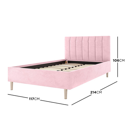 Kelly King Single Velvet Fabric Bed Frame in Pink, featuring a tall, vertically tufted headboard, side rails, footboard, and wooden tapered legs, with a slatted support system for mattress stability.