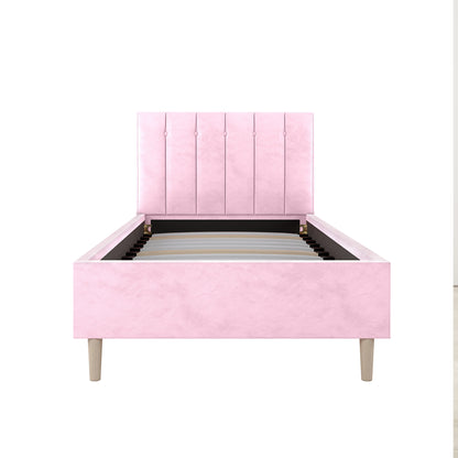 Kelly Single Velvet Fabric Bed Frame in Pink, featuring a tall, tufted headboard and a sturdy wooden slat support system, standing on tapered legs. Shown without a mattress against a plain backdrop.