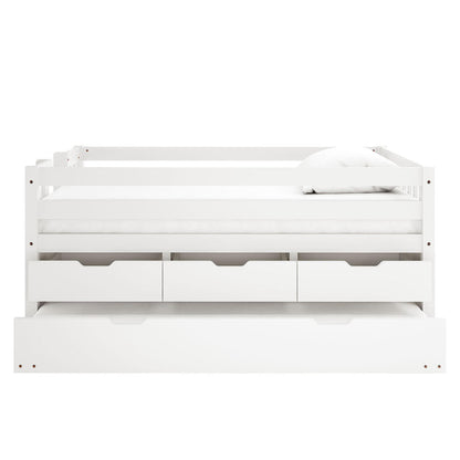 Kiki Single Solid Wood Storage Bed with Trundle in White, showcasing a sleek white frame with guard rails, three drawers, and a full-width trundle drawer, topped with a simple mattress and pillow.