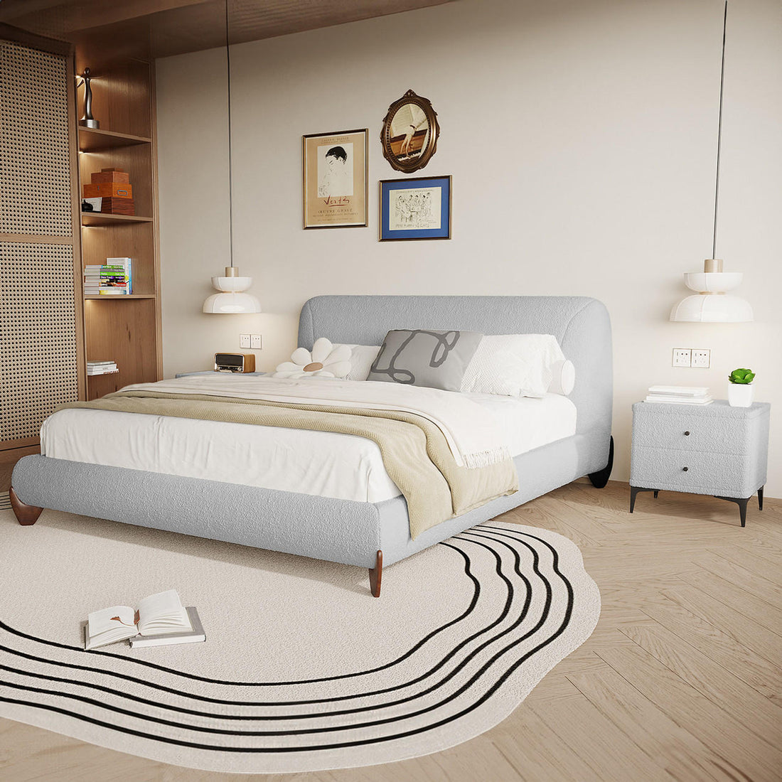 Laryn Queen Plush Bouclé Cloud Bed Frame in Light Grey, featuring a low-profile design with a padded headboard, dressed in white linens and a beige throw, creating a serene bedroom centerpiece.