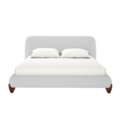 Laryn Queen Plush Bouclé Cloud Bed Frame in Light Grey features a softly rounded, upholstered headboard, matching frame, and curved wooden legs, all elegantly styled with a minimalist, low-profile design.