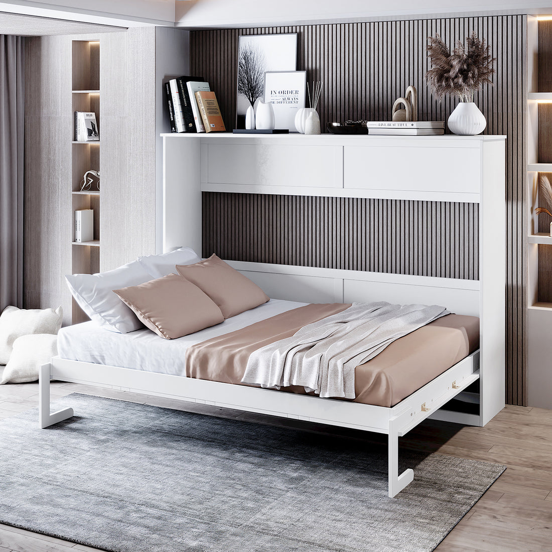 Leeton Space-Saving Queen Foldout Wall Bed White shown in a minimalist bedroom, pulled down with crisp bedding. Integrated shelving holds framed prints and decor. Vertical wood slats add texture to the backdrop.