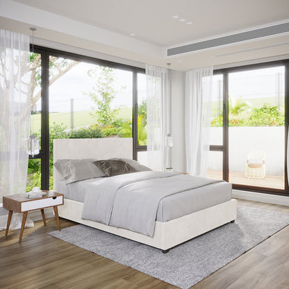 Lovita Double Bouclé Bed Frame with Gas Lift Storage in cream white, featuring light-grey bedding and pillows, sits in a bright, minimalist bedroom with mid-century nightstand and floor-to-ceiling windows overlooking a patio garden.