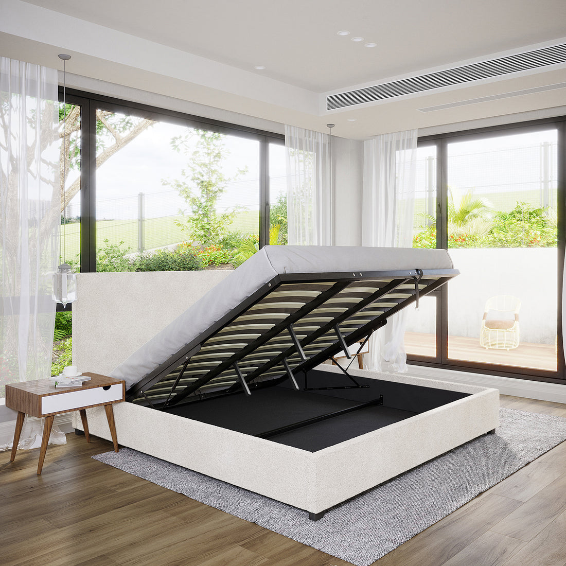 Lovita King Bouclé Bed Frame with Gas Lift Storage in cream white, featuring upholstered fabric, a puffy headboard, and an open storage compartment, situated on a gray rug in a modern bedroom.