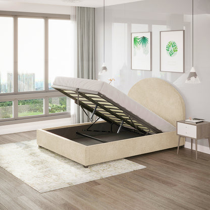 Lunia Double Boucle Gas Lift Storage Bed Frame in Cream Beige with a rounded headboard, shown open to reveal under-bed storage, alongside a light wood nightstand and botanical prints above.