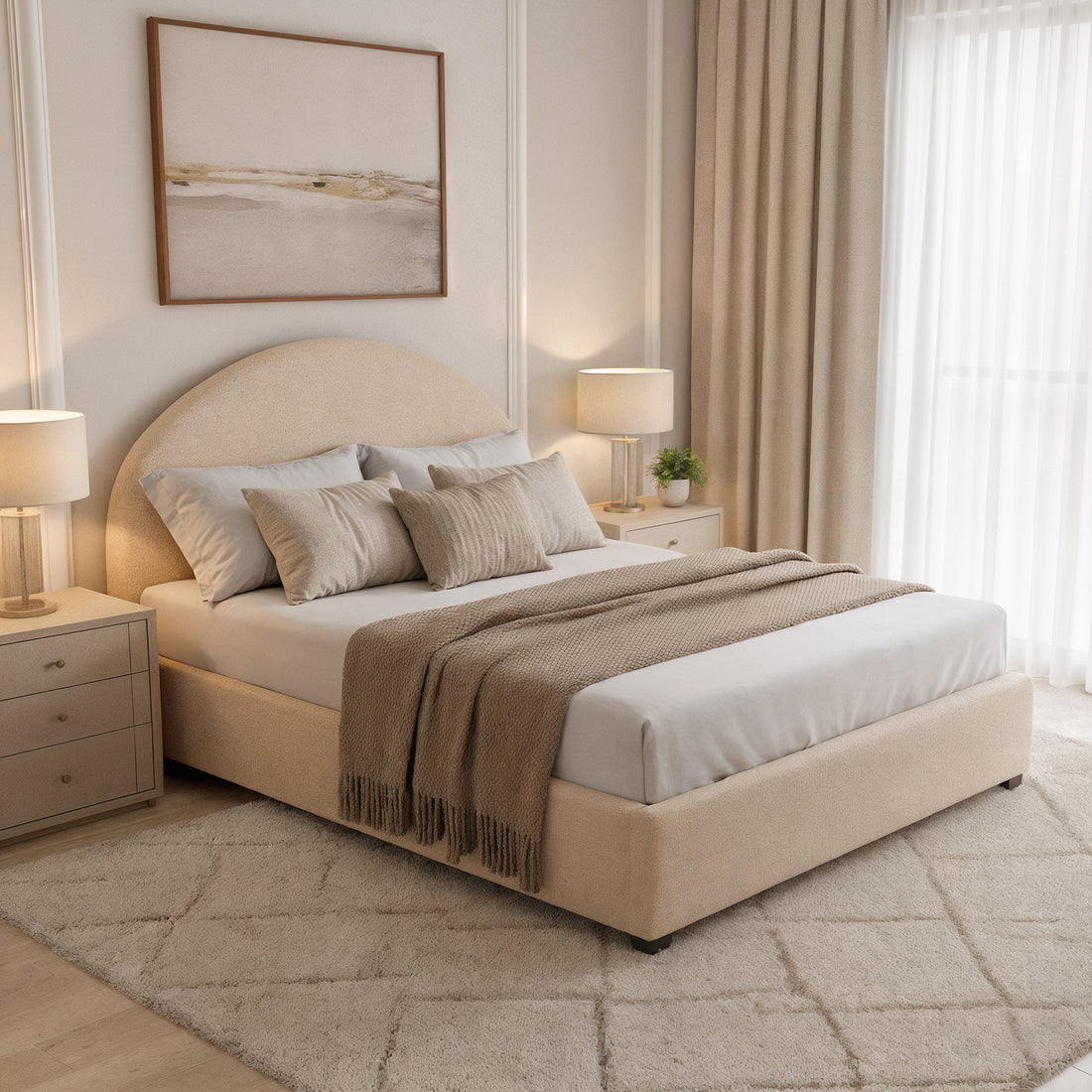 Lunia Double Bouclé Gas Lift Storage Bed Frame in Cream Beige, featuring a rounded headboard, upholstered in soft fabric, with white sheets and taupe pillows, flanked by lit nightstands and a soothing landscape painting.