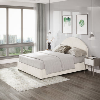 Lunia Double Bouclé Bed Frame with Gas Lift Storage – Cream White, featuring soft off-white fabric, light gray bedding, and neutral pillows, set in a modern bedroom with minimalist decor and large windows.