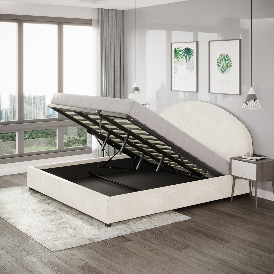 Lunia King Bouclé Bed Frame with Gas Lift Storage in a modern bedroom, featuring an open mattress platform revealing storage, a mid-century nightstand, pendant lights, and botanical prints reflected on a glossy wall.