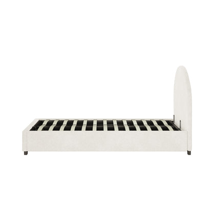Lunia King Single Bouclé Bed Frame with Gas Lift Storage in cream white; side-profile view shows off-white upholstery, low block feet, curved support slats, and arched headboard, mattress absent.