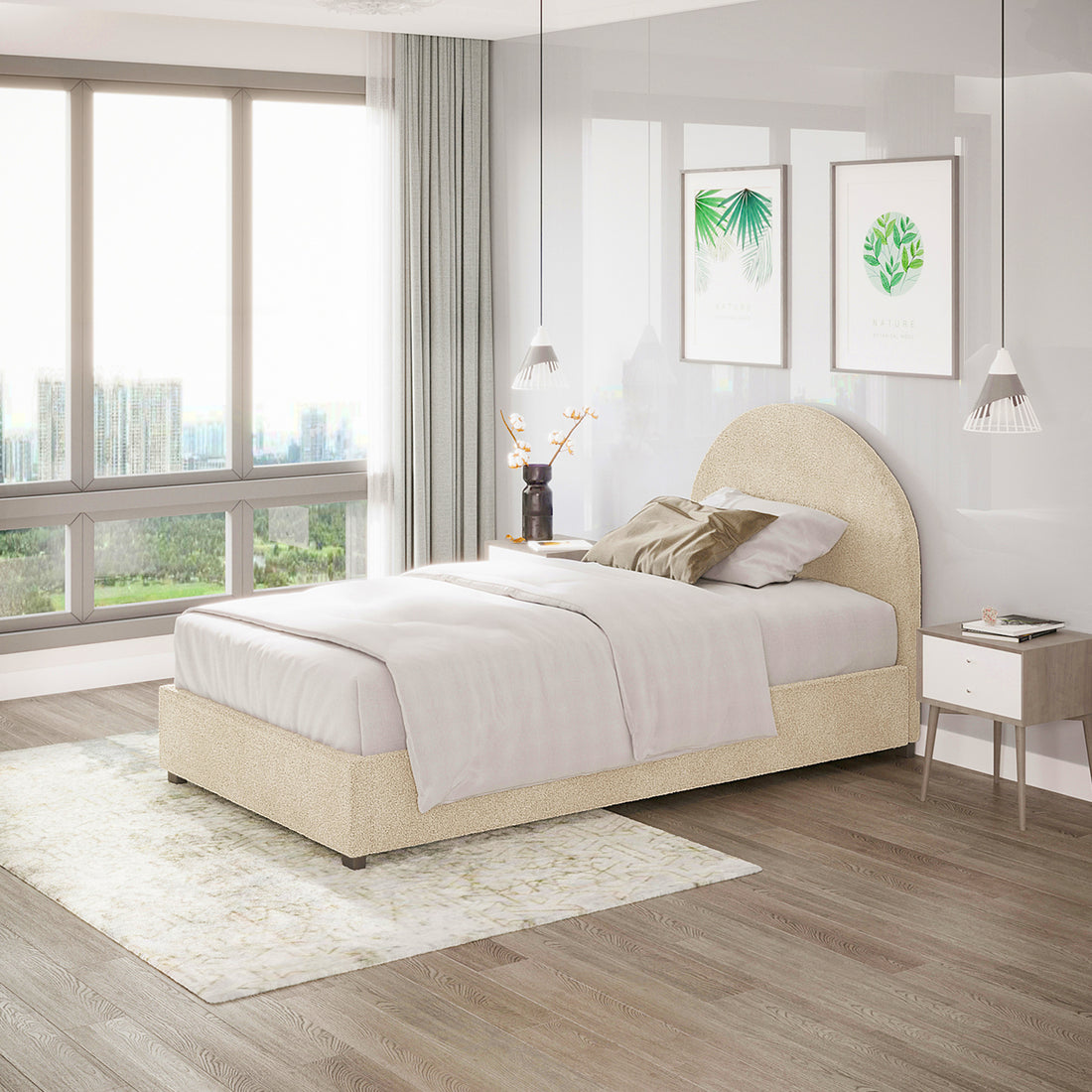 Lunia Single Bouclé Gas Lift Bed Frame in Cream Beige, upholstered in soft fabric, features a low-profile design with a taupe accent pillow, flanked by pendant lights, beneath framed botanical prints.