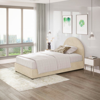 Lunia Single Bouclé Gas Lift Bed Frame in Cream Beige, upholstered in soft fabric, features a low-profile design with a taupe accent pillow, flanked by pendant lights, beneath framed botanical prints.