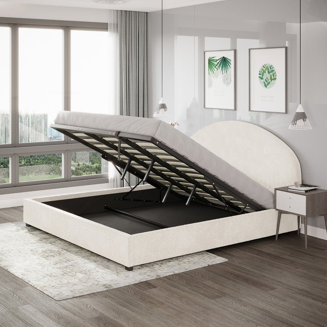 Lunia Super King Bouclé Bed Frame with Gas Lift Storage in a modern bedroom, showcasing its open storage compartment. Features cream upholstery, mid-century nightstand, pendant lights, and botanical prints nearby.