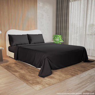 Valeria 1000TC Ultra Soft Bed Sheet Set Queen – Black displayed on a bed, showcasing its smooth texture and luxurious appearance, with a plant in the background enhancing the elegant bedroom setting.