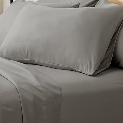 Valeria 1000TC Ultra Soft Bed Sheet Set in Grey, featuring a smooth texture with tightly woven fabric, displayed on a neatly made bed with matching pillowcases, highlighting its luxurious and elegant appeal.