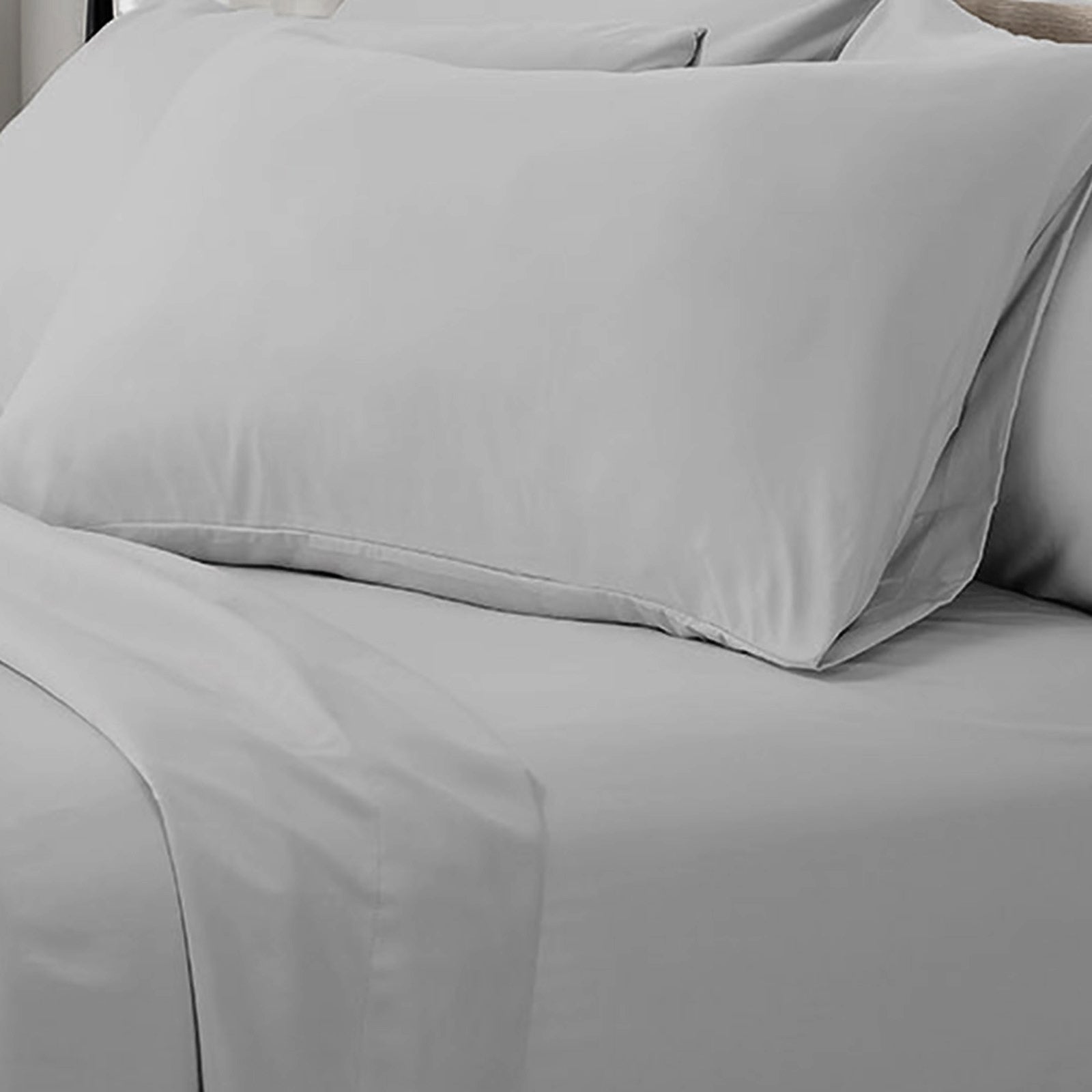 Valeria 1000TC Ultra Soft Bed Sheet Set Queen – Light Grey displayed on a bed with white sheets, showcasing its smooth, elegant texture and luxurious appeal, enhancing bedroom decor with high-quality comfort.