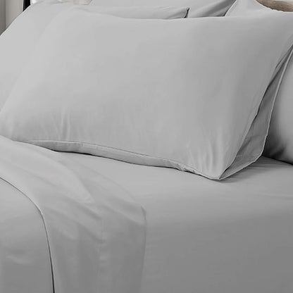 Valeria 1000TC Ultra Soft Bed Sheet Set Queen – Light Grey displayed on a bed with white sheets, showcasing its smooth, elegant texture and luxurious appeal, enhancing bedroom decor with high-quality comfort.