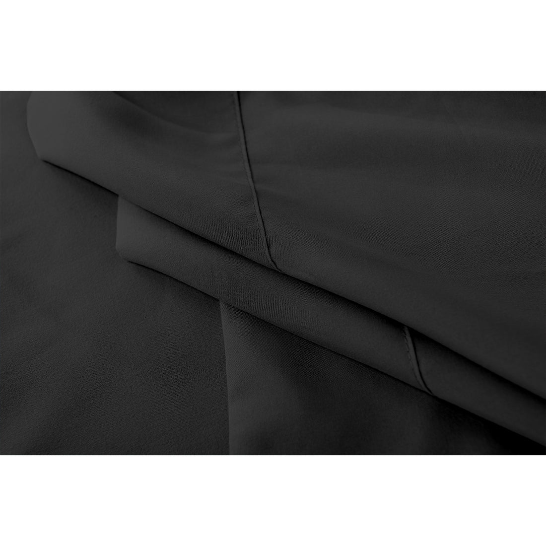 Close-up of Valeria 1000TC Ultra Soft Bed Sheet Set – Black, showcasing the luxurious black fabric's texture and fine weave, embodying sophistication and comfort for a single bed.