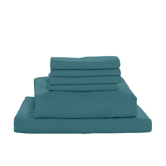 A neatly stacked set of Valeria 1000TC Ultra Soft Bed Sheet Set - Moroccan Blue Single, showcasing the soft, folded microfiber sheets and pillowcases, highlighting its luxurious texture and craftsmanship.